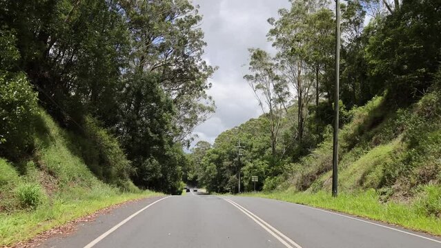 A scenic drive through a beautiful nature road in Australia