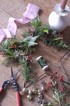 Hanging decoration ! Christmas star made of natural materials for window decoration, on the florist's table