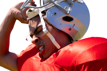 Digital png photo of tired african american football player with helmet on transparent background