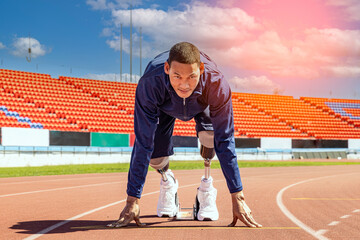 Asian para-athlete with prosthetic blades leg in stadium practicing workout for Paralympic running competition. Amputee sportsman runner practicing running workout. Disabled athlete man sport concept.