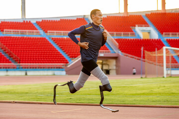 Asian para-athlete with prosthetic blades leg in stadium practicing workout for Paralympic running competition. Amputee sportsman runner practicing running workout. Disabled athlete man sport concept.