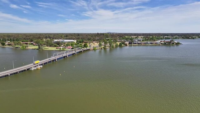 Over Lake Mulwala and alongside the bridge towards the RSL and resort houses and apartments