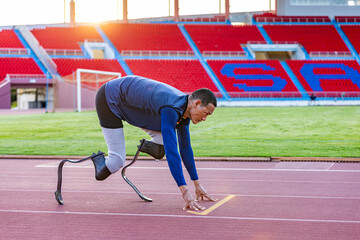 Asian para-athlete with prosthetic blades leg in stadium practicing workout for Paralympic running competition. Amputee sportsman runner practicing running workout. Disabled athlete man sport concept.