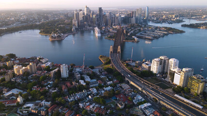 Aerial view of Sydney City, Sydney Harbour and the Harbour Bridge, NSW Australia on a sunny early...