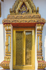 Ornate door surround with colourful ceramic tiles, Wat Pho, Bangkok, Thailand