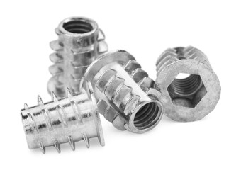 Metal insert nuts isolated on white. Hardware tool