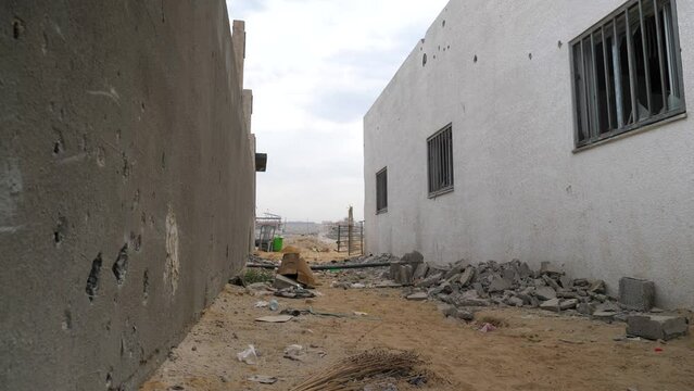 Damaged house walls after gunfire, Israel Hamas War 2023