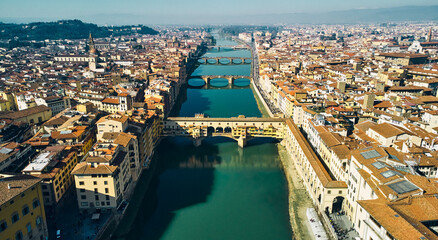 Aerial view of Ponte Vecchio bridge and Arno river in Florence. High quality photo