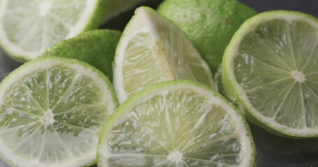 Close up of fresh sliced up limes with copy space