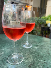 two glasses of rose wine on the table