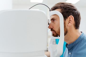 Close up of young man in ophthalmologist office