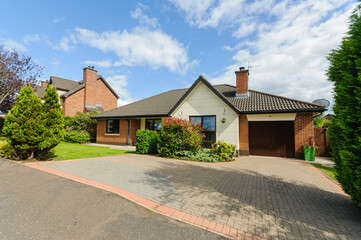 Outside of a modern, large bungalow house home in a desireable location in Northern Ireland.
