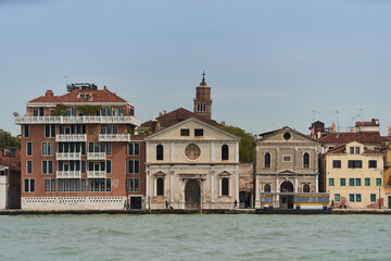 Fototapeta na wymiar The church of the Saint Spirit (Italian: Chiesa dello Spirito Santo) on Guidecca canal waterfront. Venice - 6 May, 2019
