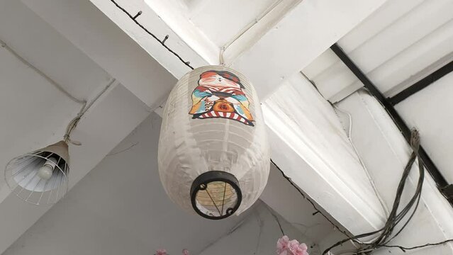 Japanese lanterns decorating the front of the house