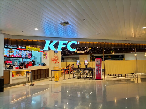 KFC (Kentucky Fried Chicken) is an American fast food restaurant chain that specializes in fried chicken. KFC restaurant building in Ahmad Yani Airport. 
