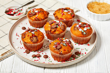 Сhristmas sweet potato muffins on plate, top view