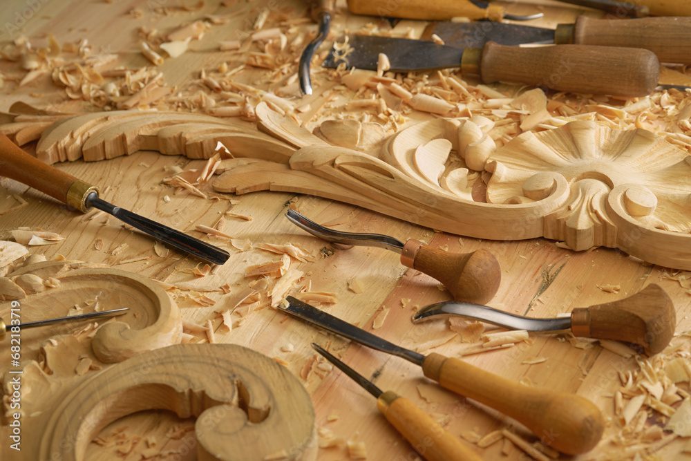 Poster Carpentry workshop with different tools on a table. Craftsmanship and skill involved in woodworking