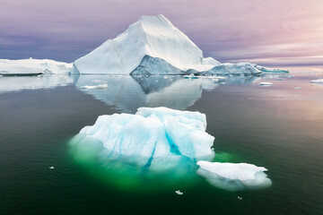 Giant iceberg floating in the Icefjord in Greenland