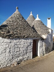Fototapeta na wymiar Traditional Trulli houses in the town of Alberobello, Apulia, Italy