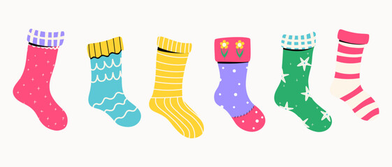 Set of baby socks with different textures and patterns. Vector illustrations.