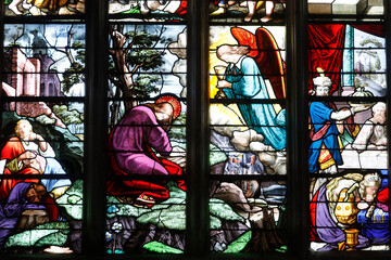 Obraz na płótnie Canvas Sainte Croix (Holy Cross) church, Bernay, Eure, France. Stained glass. Jesus in Gethsemani.