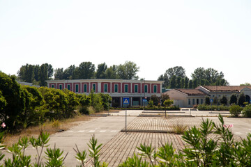 Abandoned shopping center in Italy on a hut summer day - 682205119