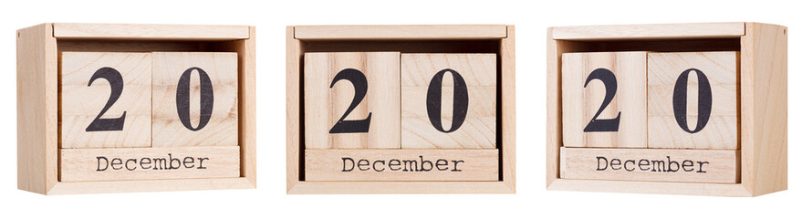 Wooden calendar, a set of dates of the month 20 December, on a white and transparent background close-up