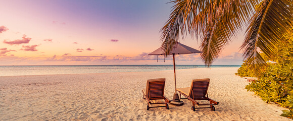 Romantic beach. Love couple chairs sandy beach sea sunset sky. Luxury summer holiday honeymoon vacation resort hotel tourism. Inspire tropical paradise. Tranquil honeymoon relax beach beauty landscape - obrazy, fototapety, plakaty