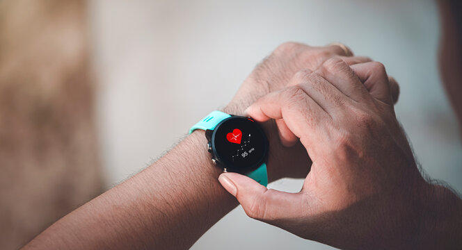 Close-up smart watch with icon Heart rate, health monitoring with smart watch, healthcare concept. Concept of The technology to check health while exercising,