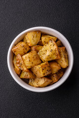 Delicious crispy fried potato wedges with salt, spices and herbs