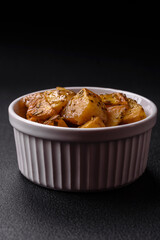 Delicious crispy fried potato wedges with salt, spices and herbs