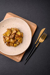 Delicious crispy fried potato wedges with salt, spices and herbs