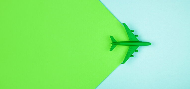 Sustainable aviation concept - green plane. Banner image, copy space.