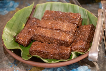 Tempe bacem, Tempeh that is processed and coated in sugar, a food made from tofu that is sweetly spiced and is a typical Indonesian culinary dish