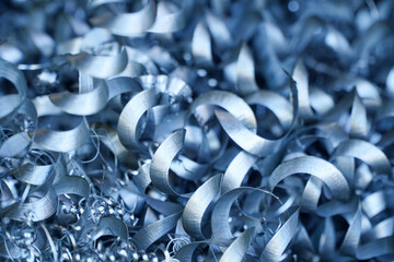 Steel scrap materials recycling. Aluminum chip waste after machining metal parts on a cnc lathe....