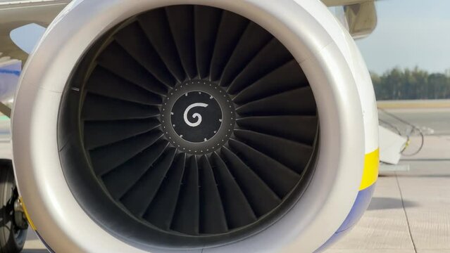 Jet engine of a big passenger aircraft at the airport