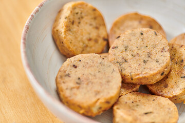 healthy vegetarian eating concept, close up view of bowl with delicious homemade vegetarian cutlets