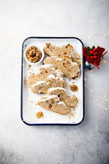 Traditional homemade Christmas stollen with nuts