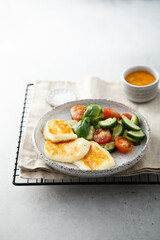 Roasted halloumi cheese with vegetables