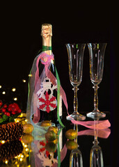 Champagne on a festive table with candles