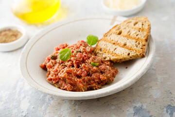 Traditional steak tartare with capers