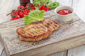Grilled pork steak with ketchup