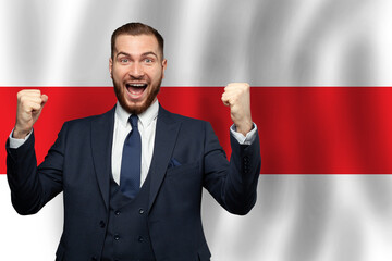 Belarussian happy businessman on the background of flag of Belarus Business, education, degree and...