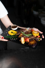 meat board on a black background