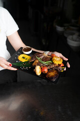 meat board on a black background