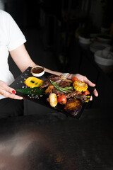 meat board on a black background