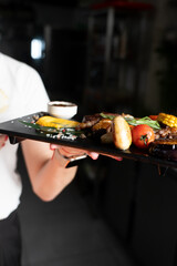 meat board on a black background