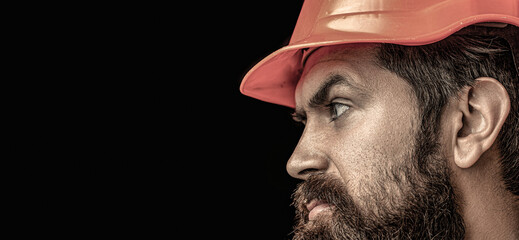 Bearded man worker with beard in building helmet or hard hat. Portrait builder, civil engineer...