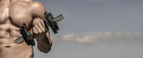 Male male raising a dumbbell. Man hand holding dumbbell in hand. Man in sports with dumbbells. Strong hand man lift a weight, dumbbells