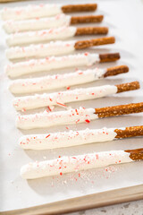 Candy cane chocolate covered pretzel rods